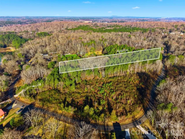 a view of a city with lots of trees