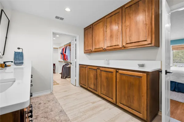 a hallway with washer and dryer