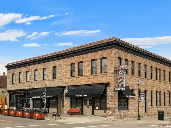 a view of a building with a street