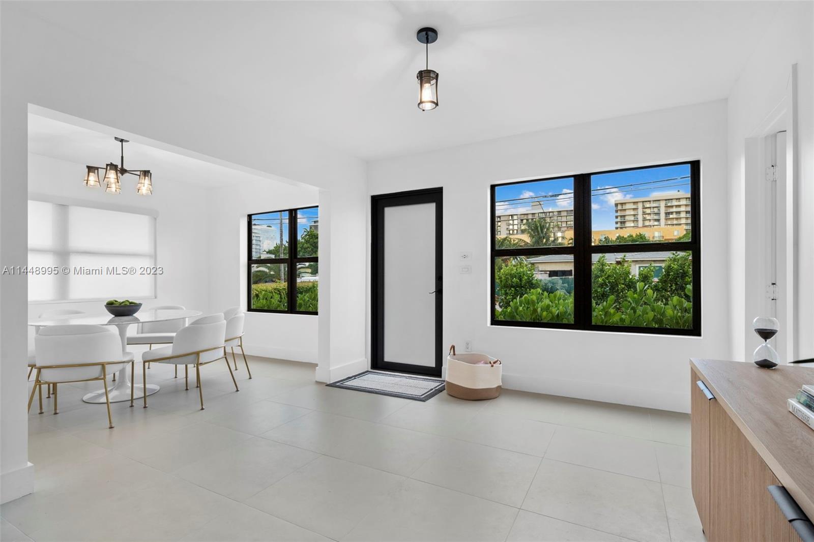 8844 Abbott Avenue Surfside, FL 33154 - Photo 3 of 11 a view of an empty room with a window