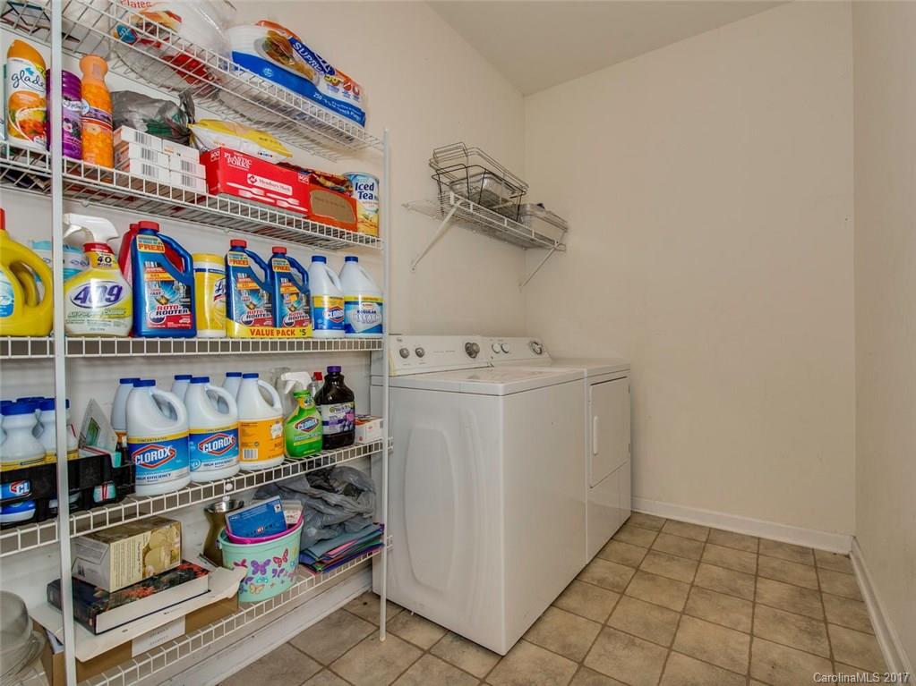 932 Garrison Road Charlotte, NC 28262 - Photo 12 of 20 a utility room with dryer and washer