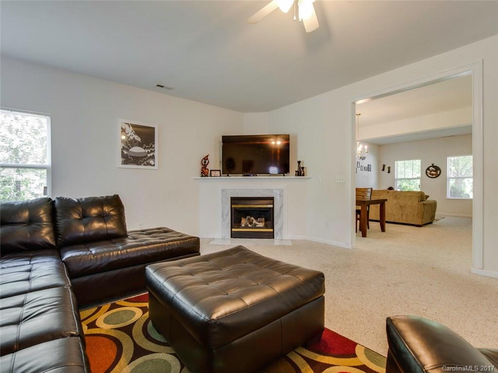 932 Garrison Road Charlotte, NC 28262 - Photo 9 of 20 a living room with furniture and a flat screen tv