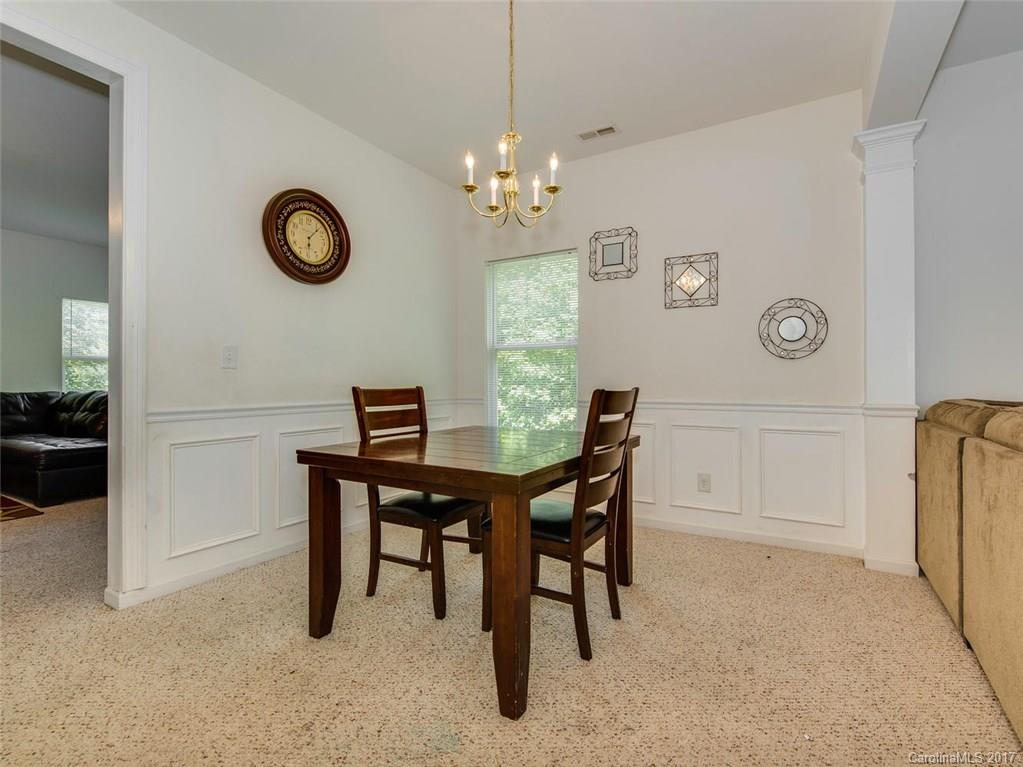932 Garrison Road Charlotte, NC 28262 - Photo 10 of 20 a view of a dining room with furniture