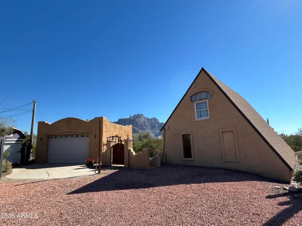 a view of house with a outdoor space and sitting space