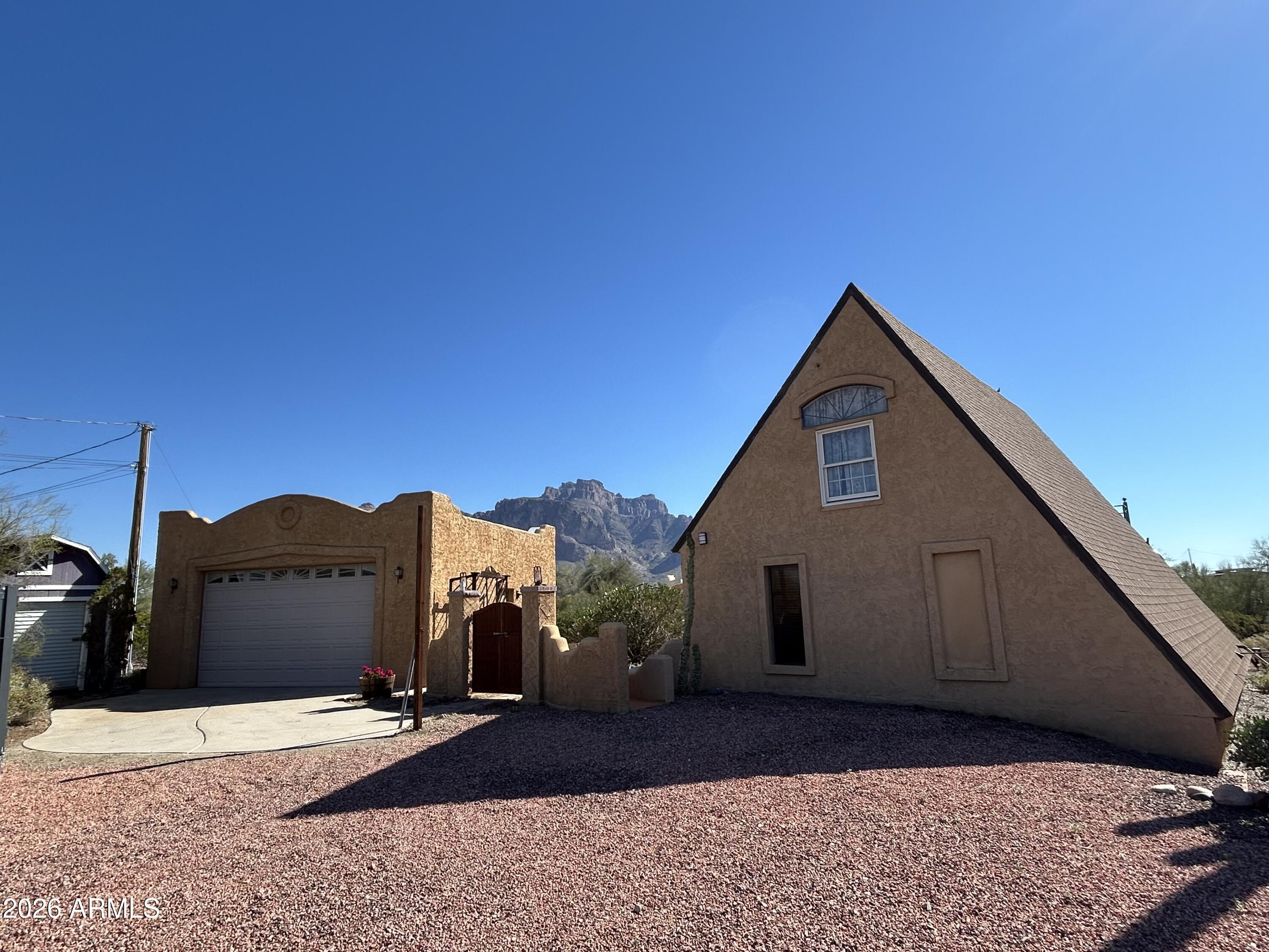 a view of house with a outdoor space and sitting space
