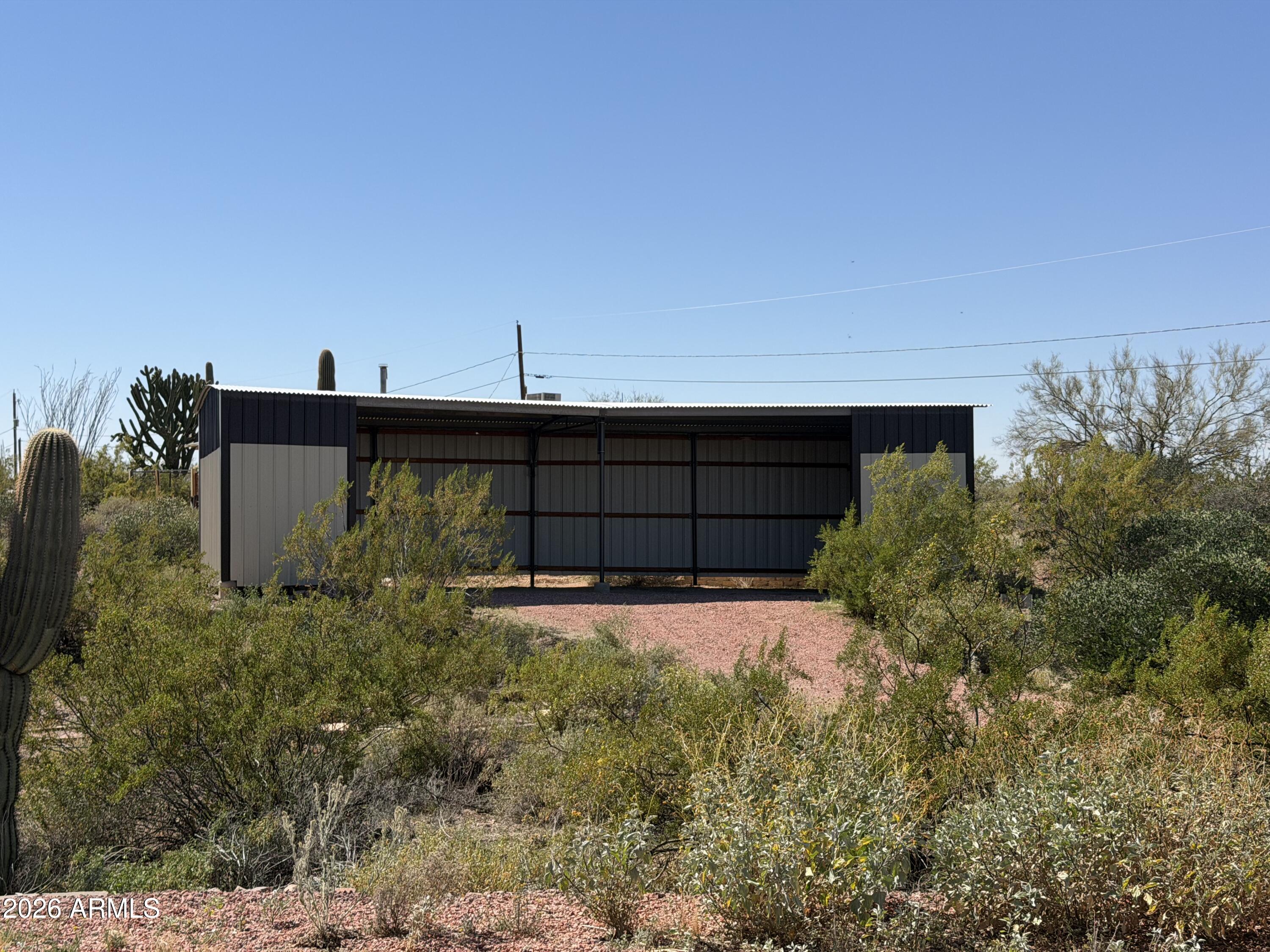 1315 North Arroya Road Apache Junction, AZ 85119 - Photo 17 of 24 a view of a backyard