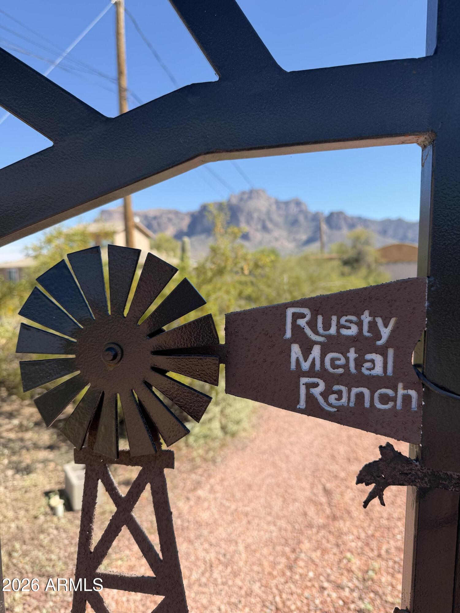 1315 North Arroya Road Apache Junction, AZ 85119 - Photo 20 of 24 a view of a terrace with a table and chairs