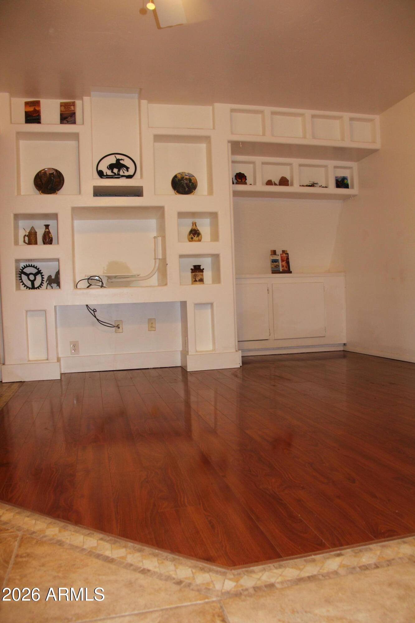 1315 North Arroya Road Apache Junction, AZ 85119 - Photo 9 of 24 a view of walk in closet with clothes and shoes