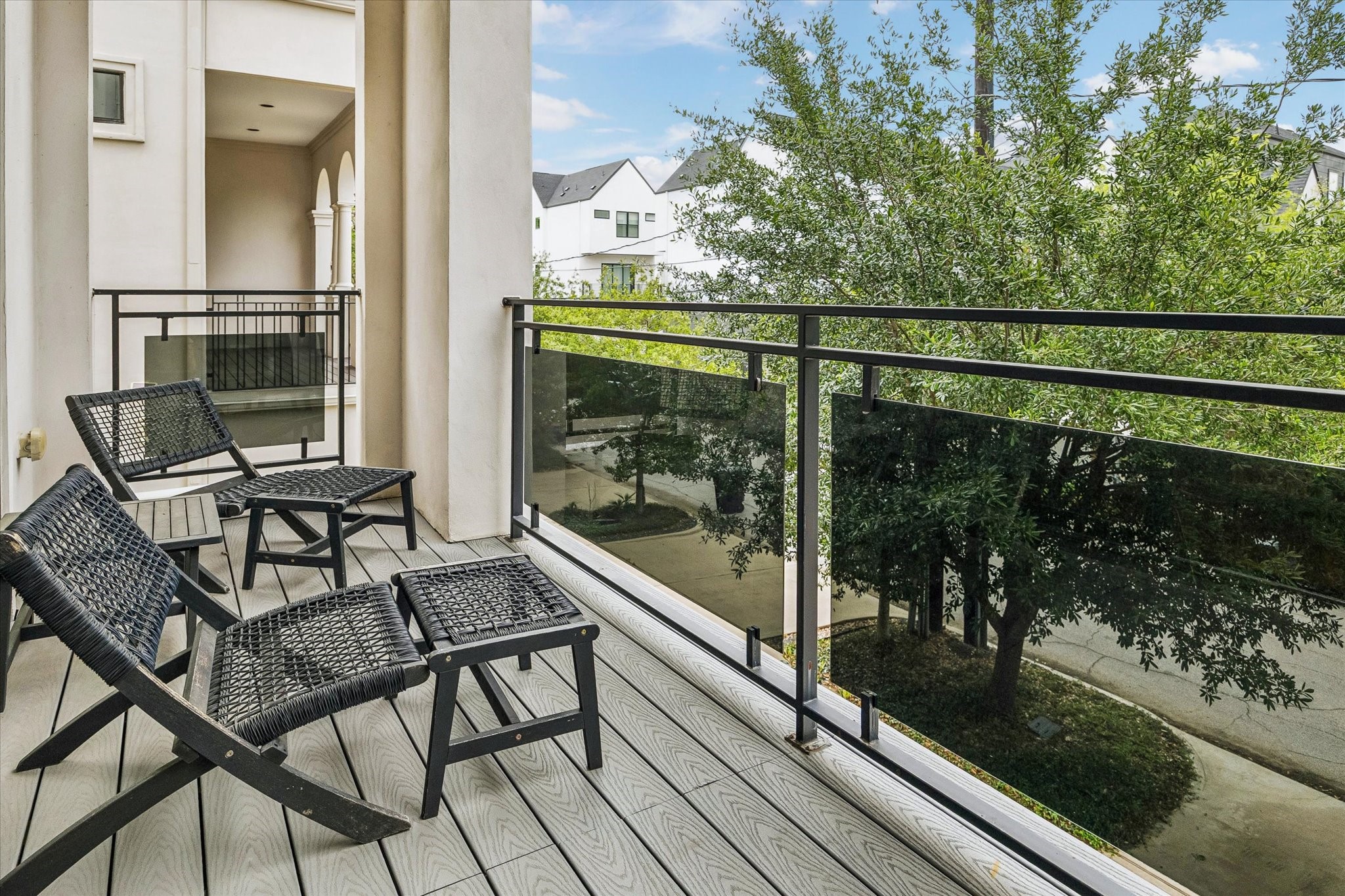 1526 Vermont Street Houston, TX 77006 - Photo 16 of 39 Covered balcony just off the main living area offers a quiet spot to relax among the trees.