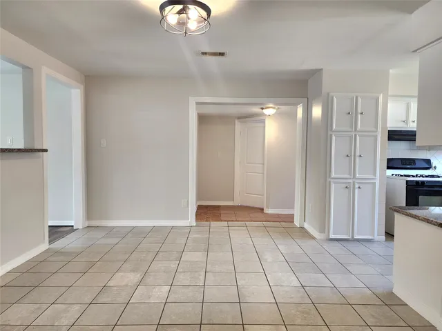 a view of livingroom with kitchen