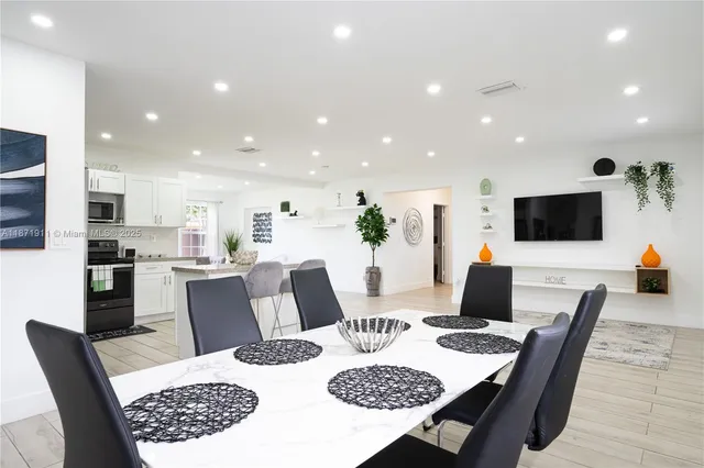 a view of a dining room with furniture