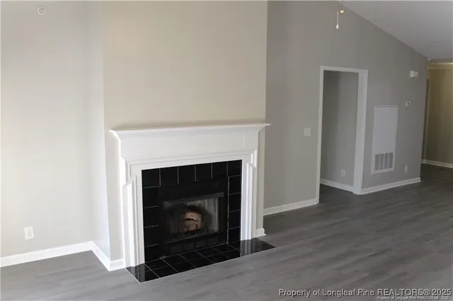 a living room with a fireplace