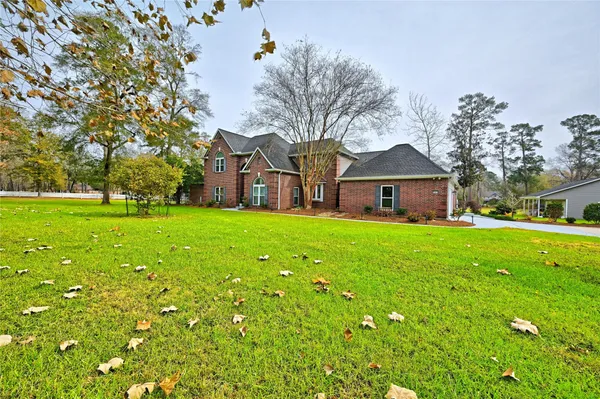 a house view with a garden space