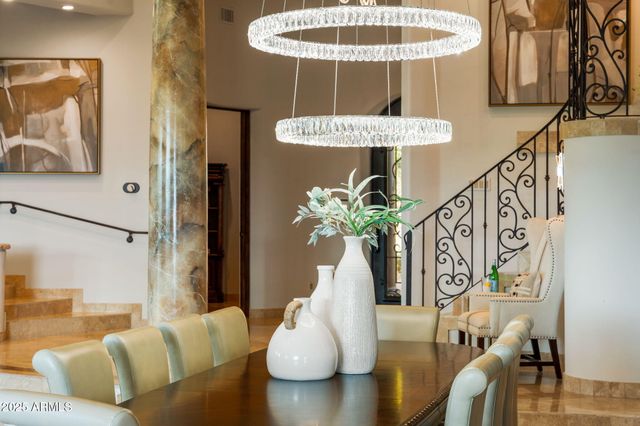 a view of a living room and dining room