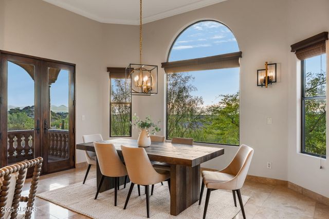a kitchen with granite countertop a sink and a stove