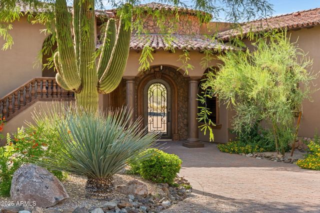 a view of a terrace with a garden and mountain view