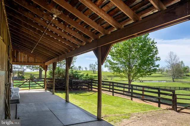 a view of a backyard of the house