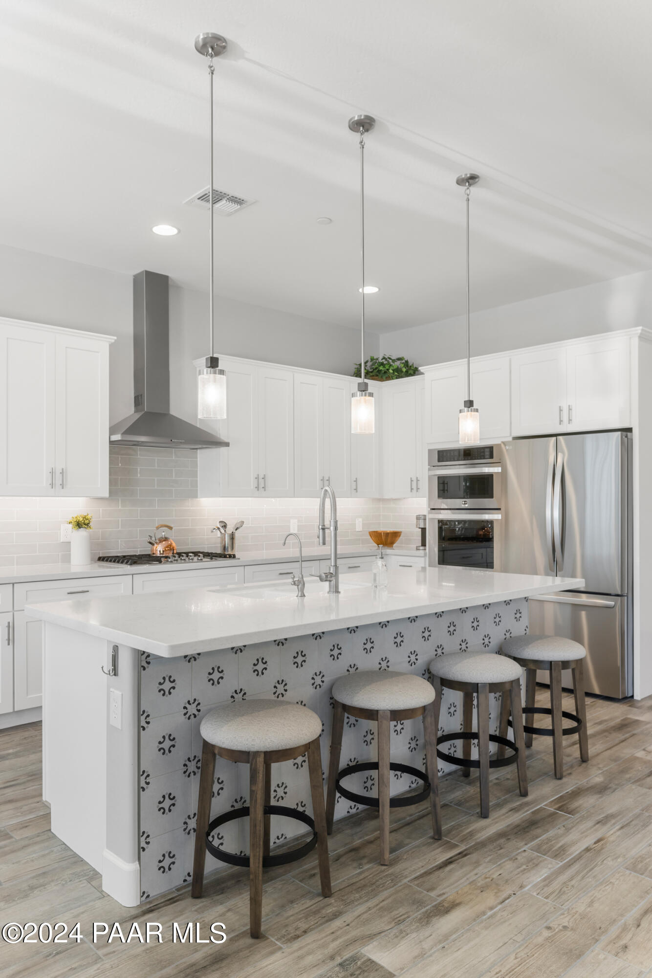 2800 Brooks Range Prescott, AZ 86301 - Photo 13 of 64 a kitchen with a table chairs stainless steel appliances and cabinets
