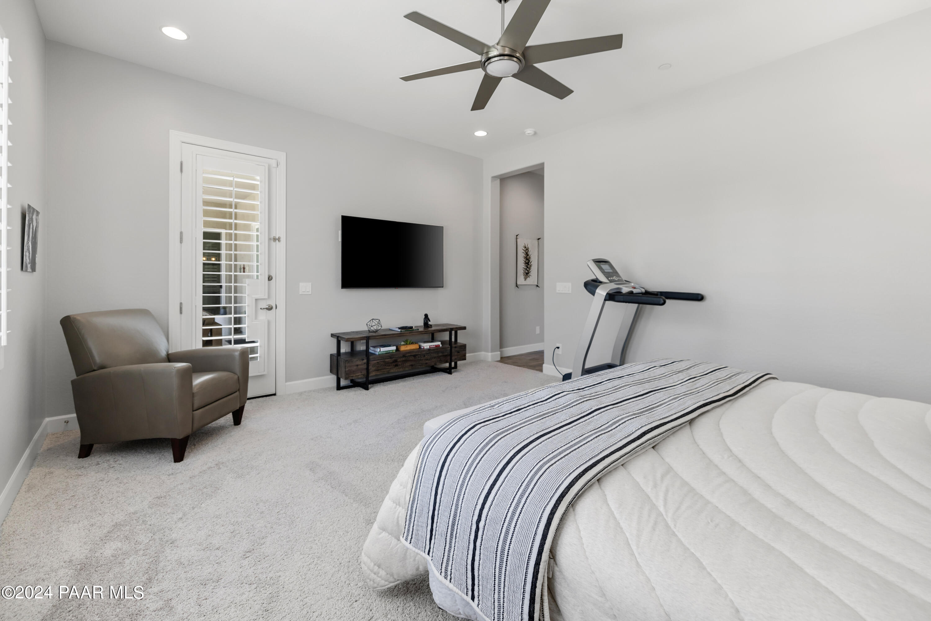 2800 Brooks Range Prescott, AZ 86301 - Photo 22 of 64 a bedroom with bed a couch and a flat screen tv