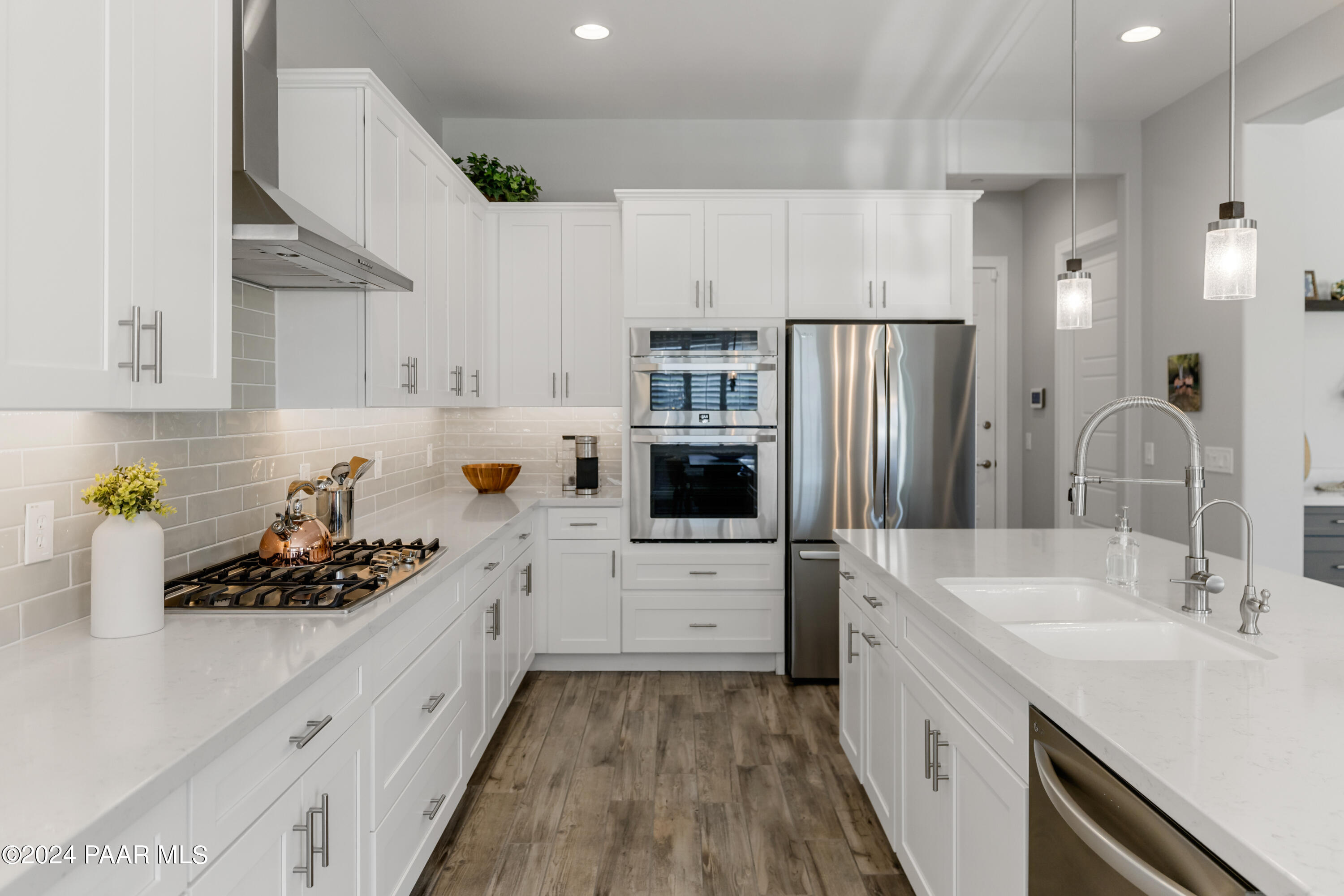 2800 Brooks Range Prescott, AZ 86301 - Photo 10 of 64 a kitchen with white cabinets and appliances