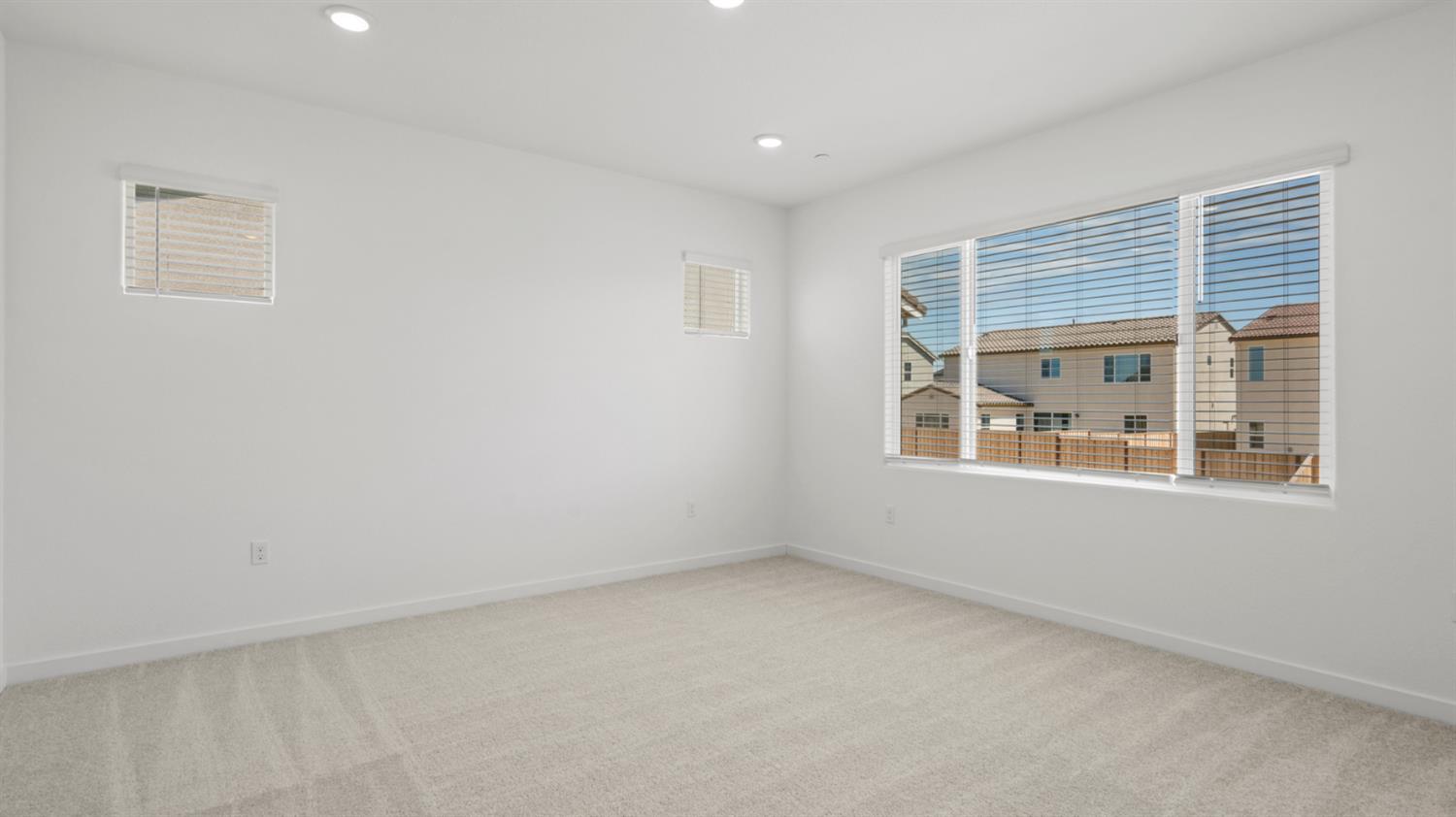 229 Rafters Court Lincoln, CA 95648 - Photo 7 of 13 an empty room with a window
