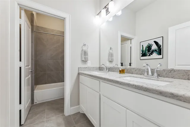 a bedroom with a bed and a table