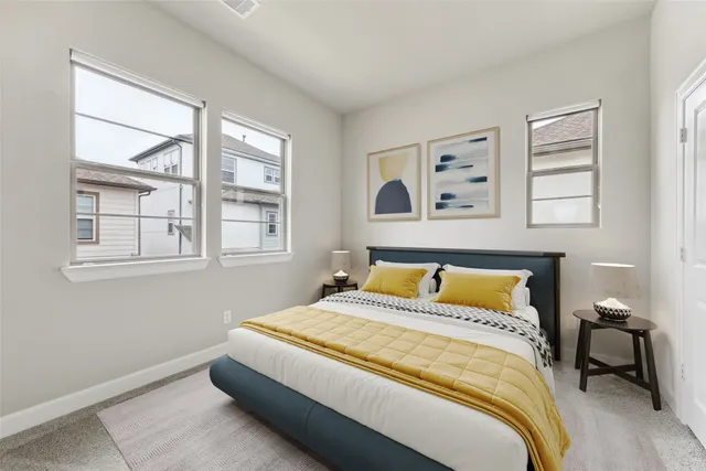 a bathroom with a granite countertop sink a mirror and a bathtub