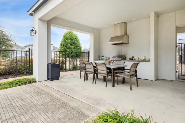 a view of a swimming pool with a lounge chair