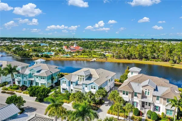 a view of a lake with a house in the background