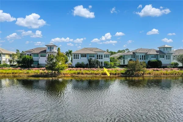 a view of a swimming pool with lounge chair