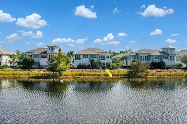 a view of a swimming pool with lounge chair