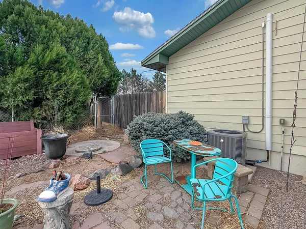 a view of a fire pit with a patio