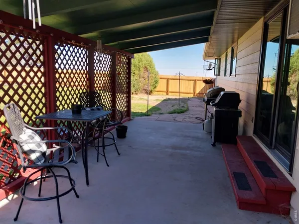 a view of a garden with patio