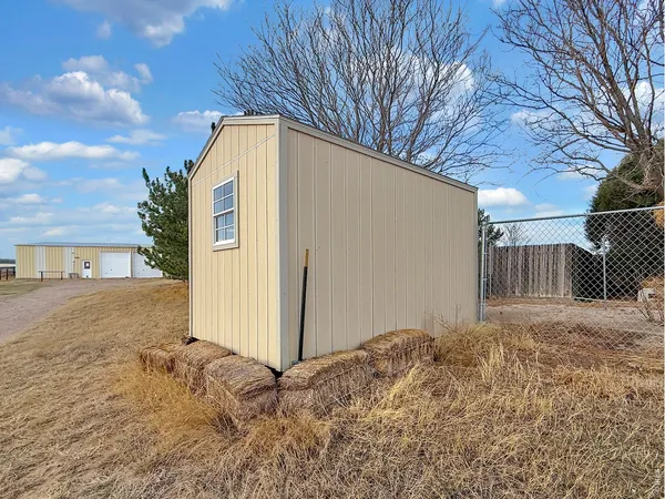 a view of a lake from a yard