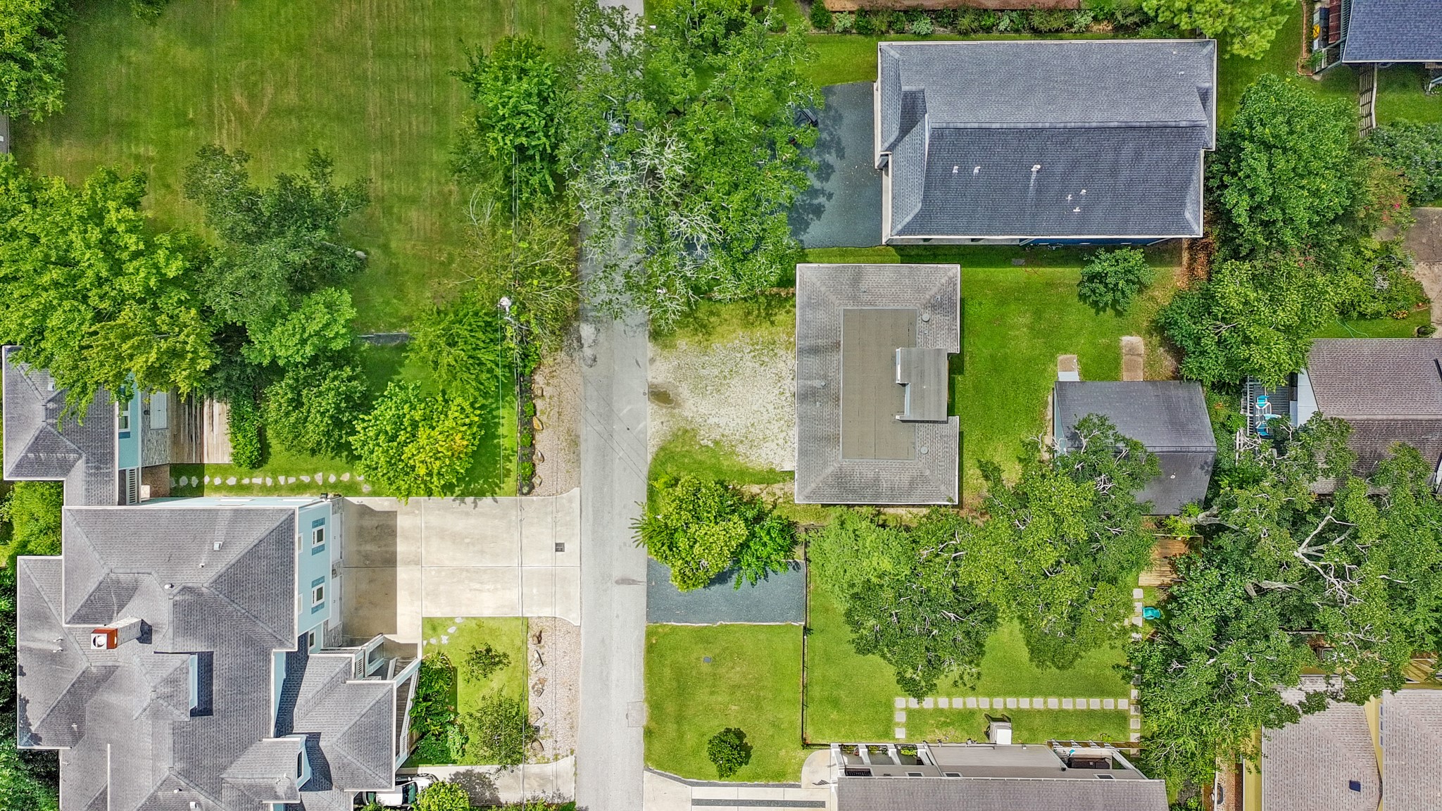 220 Pine Road Clear Lake Shores, TX 77565 - Photo 26 of 31 an aerial view of a house with garden space and a street view
