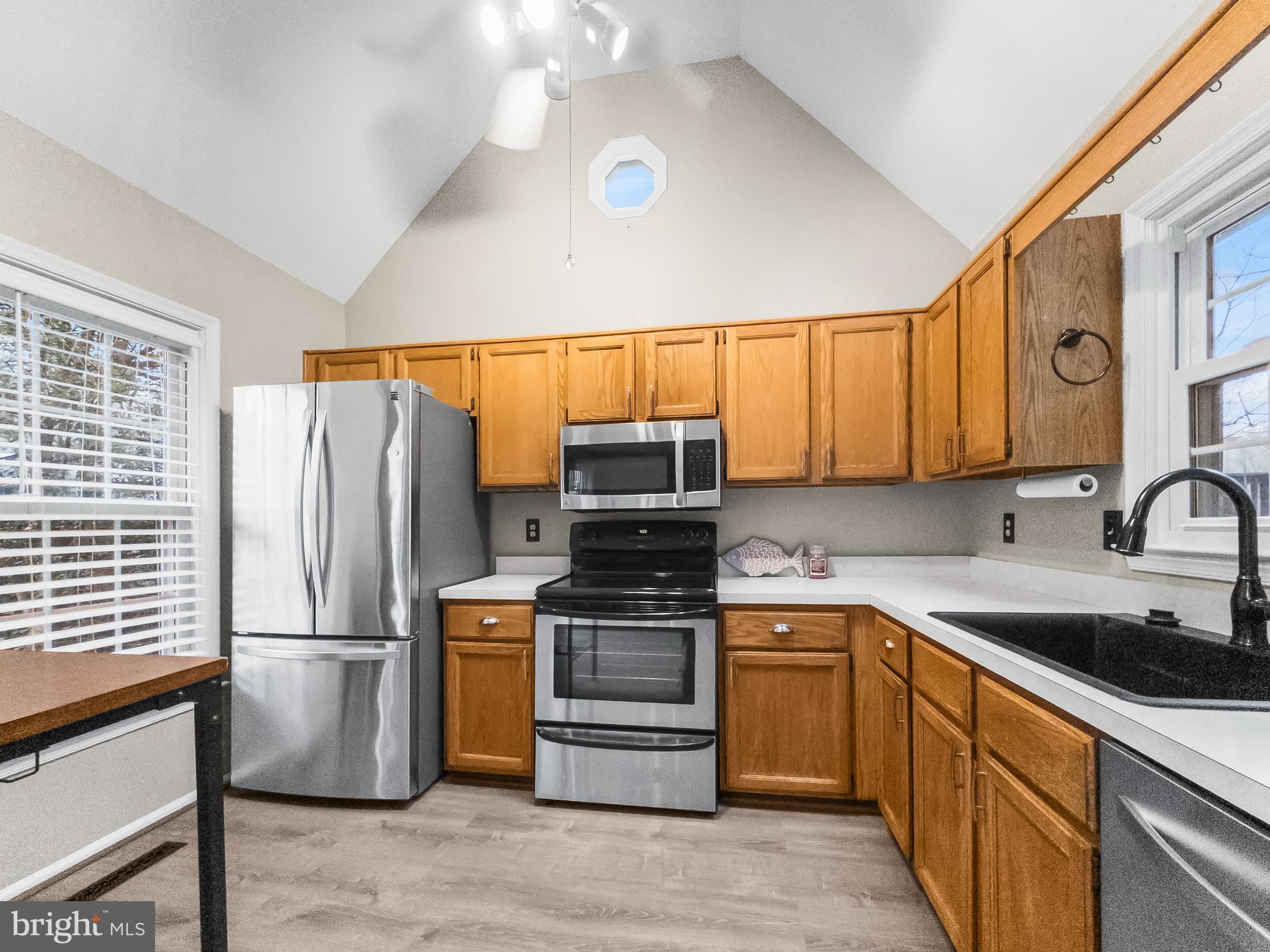 6586 Hemlock Point Road New Market, MD 21774 - Photo 4 of 19 Kitchen with window overlooking the lake from sink