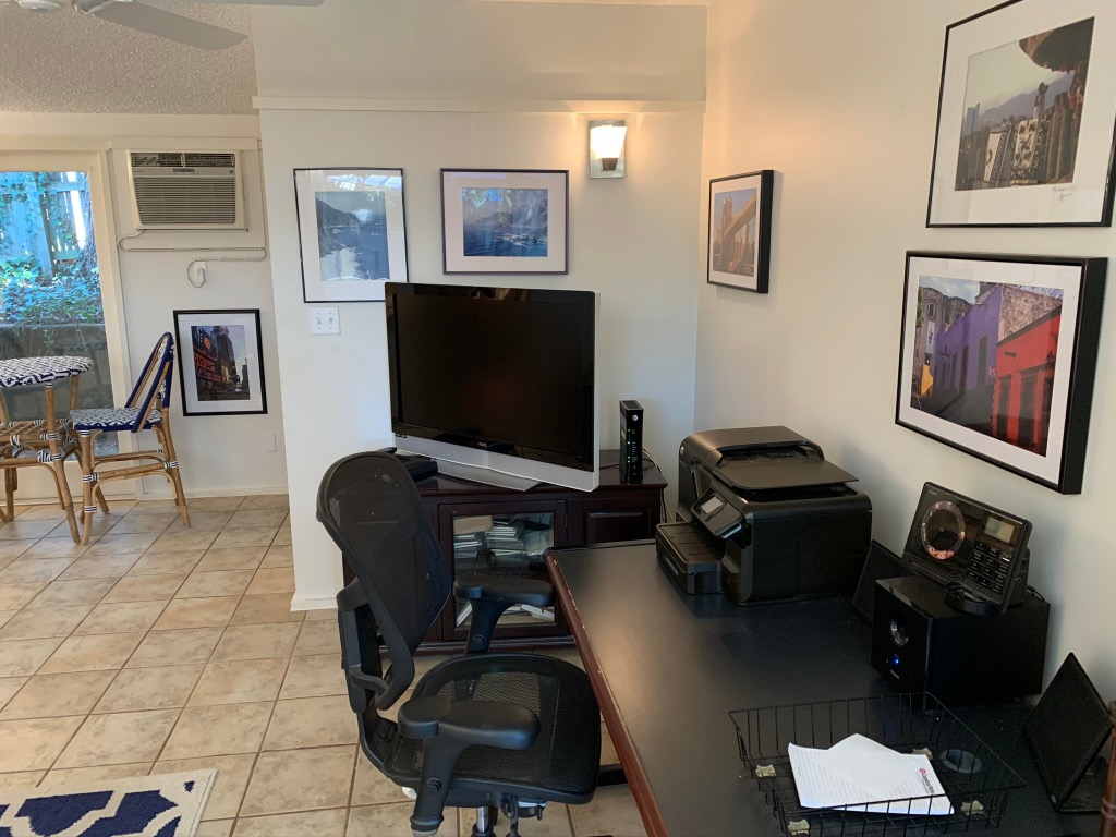 1714 Summit View Place, Unit 3 Austin, TX 78703 - Photo 7 of 17 Home office featuring ceiling fan, light tile patterned floors, baseboards, and a wall mounted AC