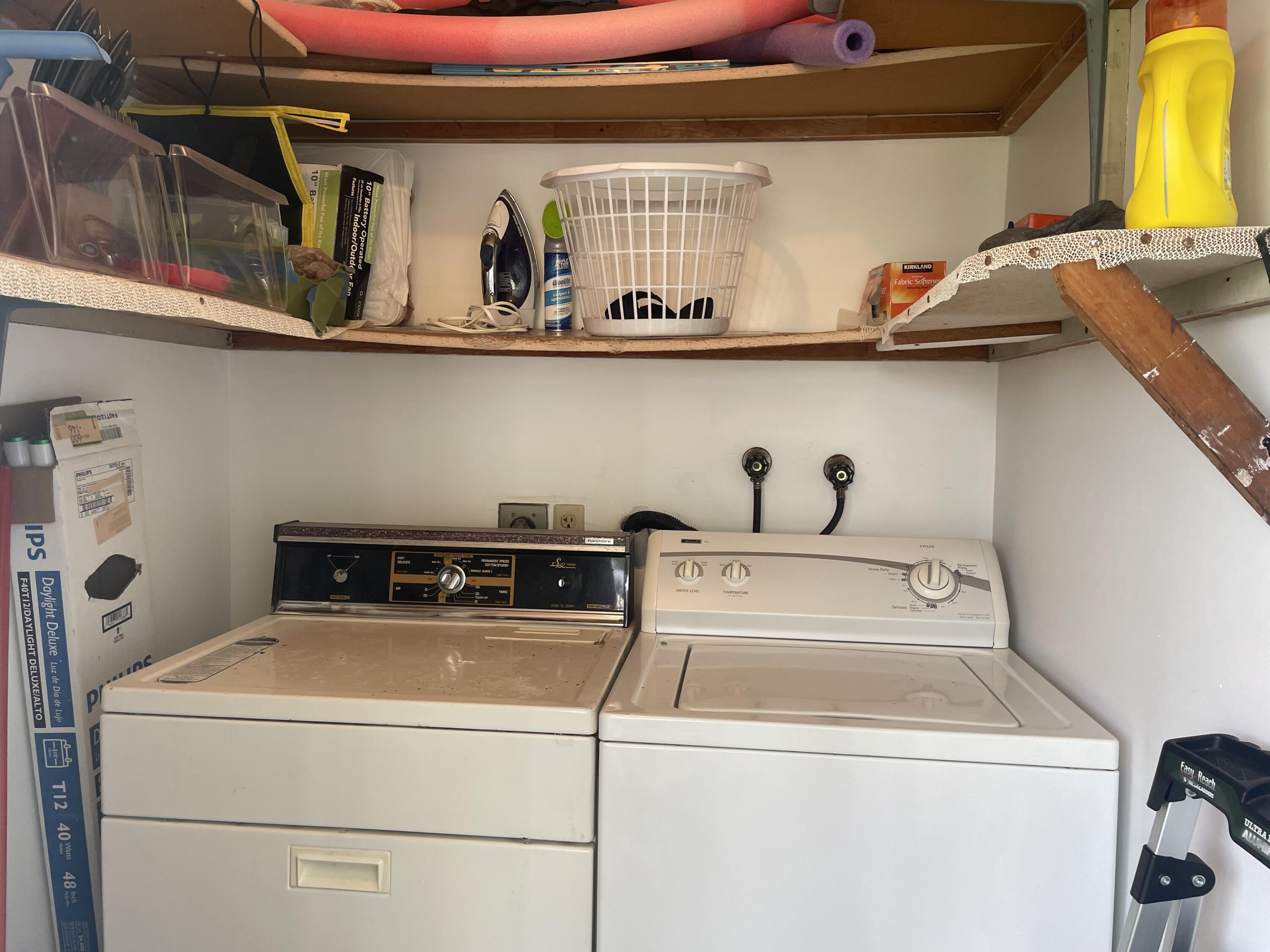 705 Normandy Lane, Unit 705 Delray Beach, FL 33484 - Photo 25 of 37 a utility room with dryer and washer
