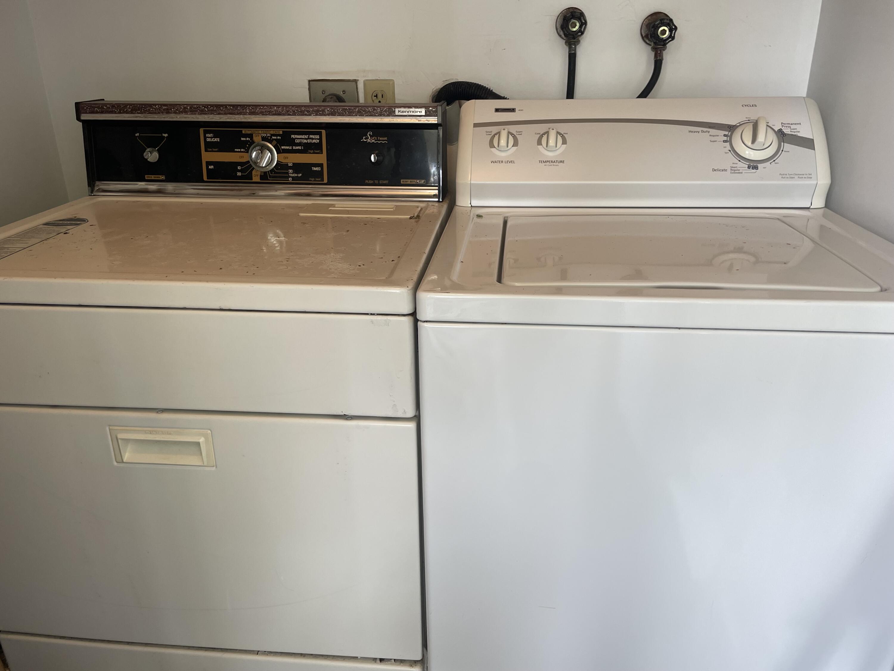 705 Normandy Lane, Unit 705 Delray Beach, FL 33484 - Photo 27 of 37 a utility room with dryer and washer