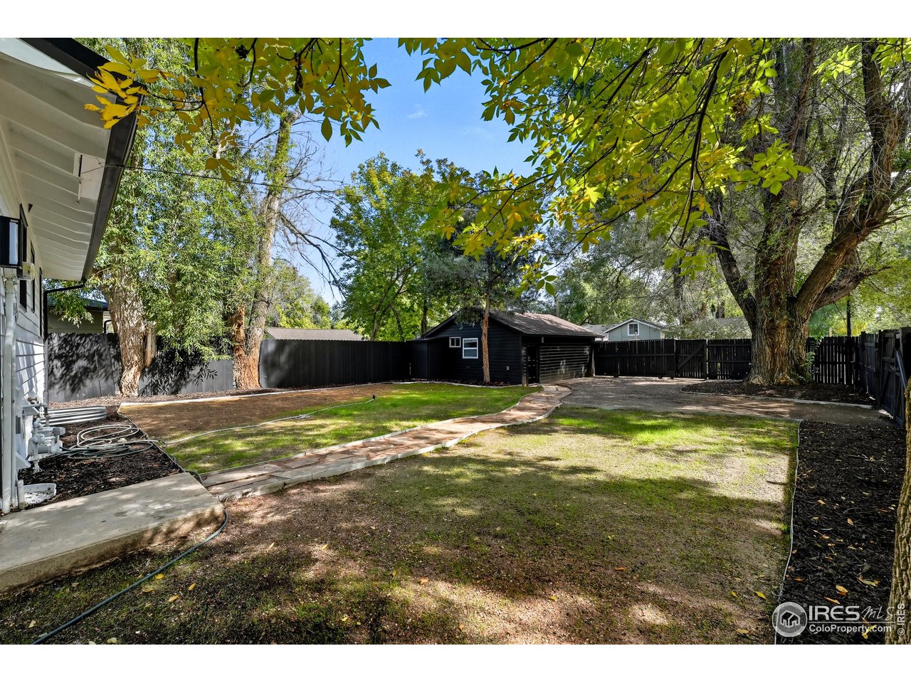 200 Bishop Street Fort Collins, CO 80521 - Photo 27 of 32 a view of a backyard with large trees