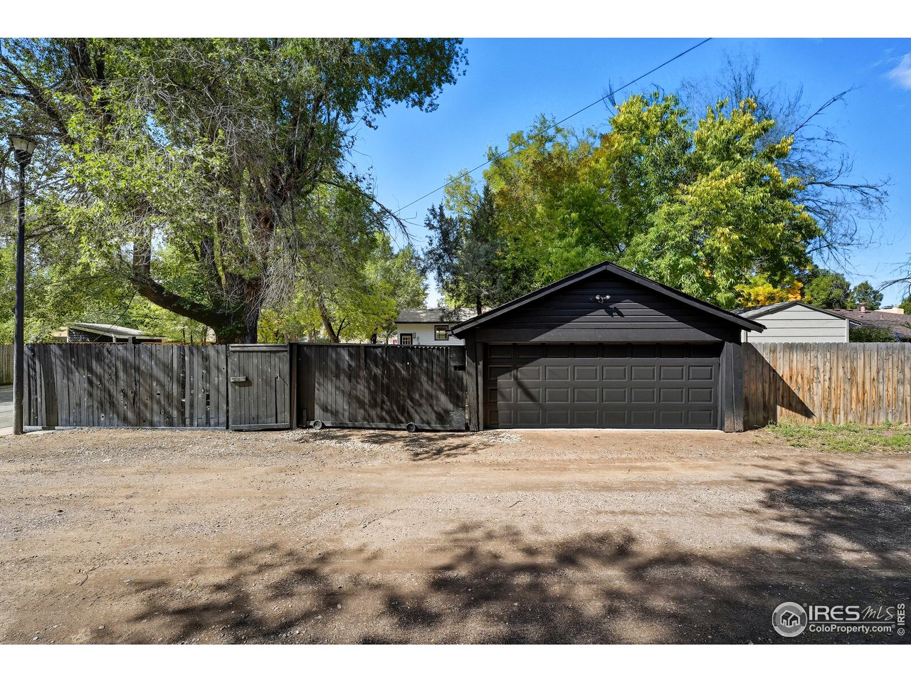 200 Bishop Street Fort Collins, CO 80521 - Photo 32 of 32 a house with trees in the background