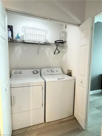 a utility room with dryer and washer