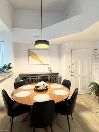 a view of a dining room with furniture