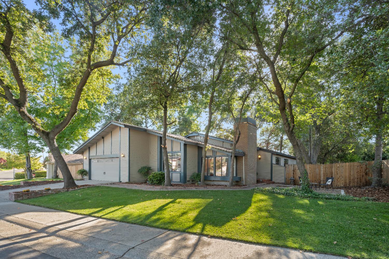 6427 Wittenham Way Orangevale, CA 95662 - Photo 4 of 51 a view of a house with a yard and tree s