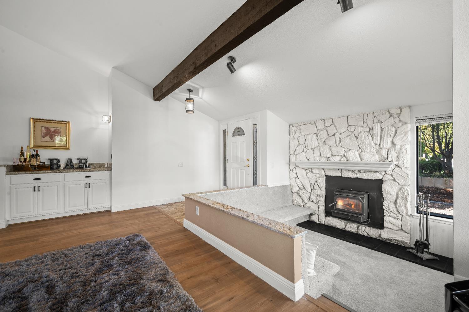 6427 Wittenham Way Orangevale, CA 95662 - Photo 8 of 51 a living room with stainless steel appliances granite countertop furniture and a fireplace