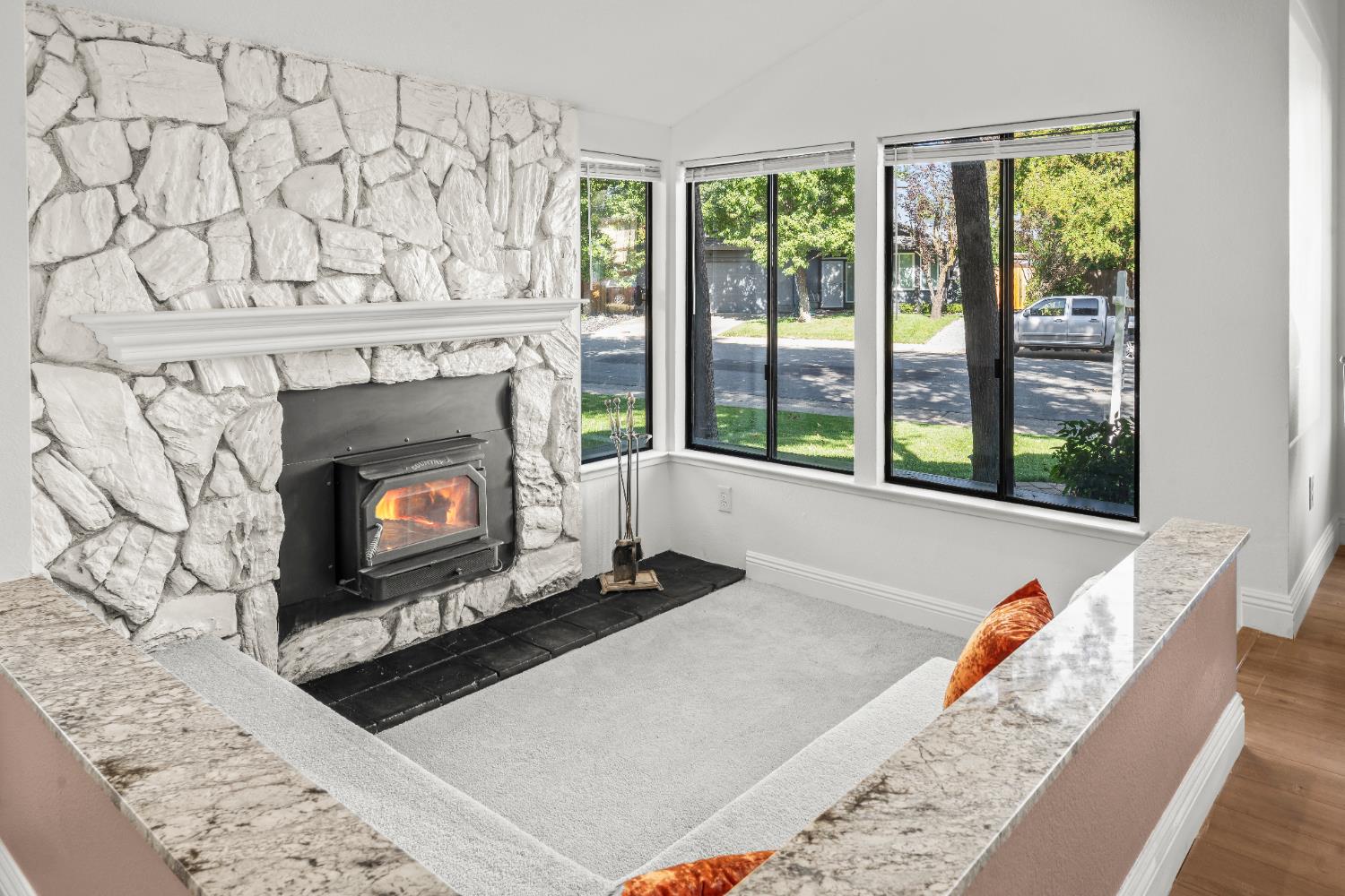 6427 Wittenham Way Orangevale, CA 95662 - Photo 9 of 51 a living room with a fireplace and a floor to ceiling window