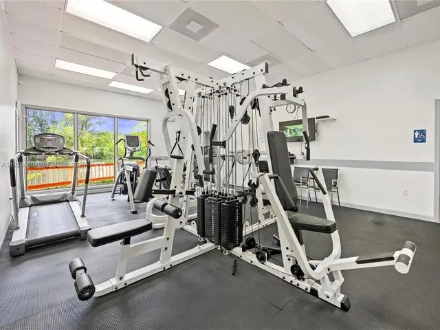a view of a room with gym equipment