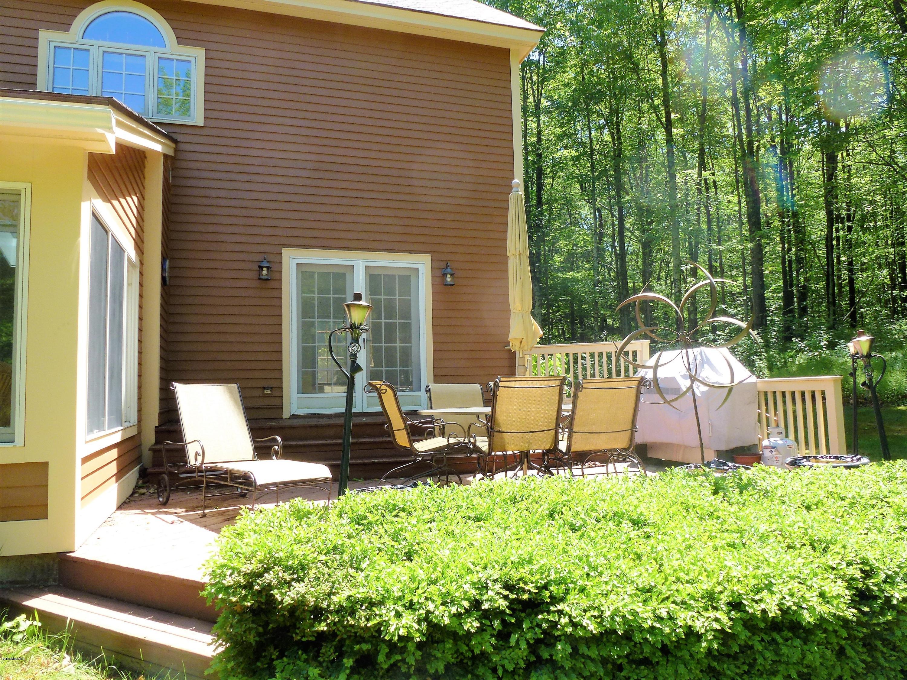 94 Roys Road New Ashford, MA 01237 - Photo 8 of 30 Sunroom and deck