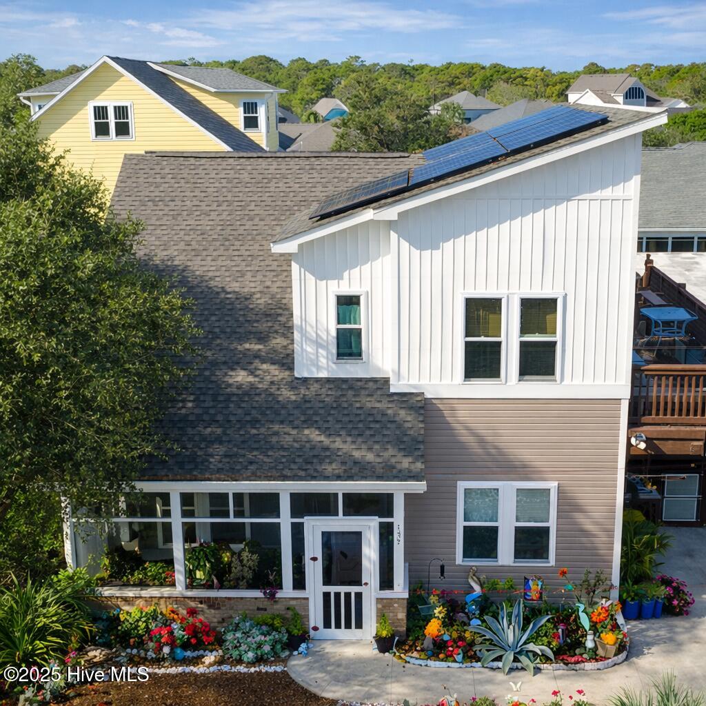 Photo was digitally altered to remove vehicles, power lines, and digitally brighten landscaping. Professional photos will be uploaded.