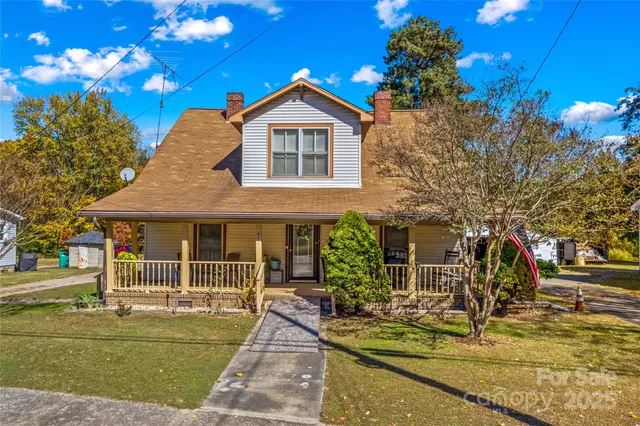 a front view of a house with swimming pool